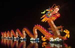 Dragon Reflection in the water as part of the Chinese or Lunar New Year Ceremonies